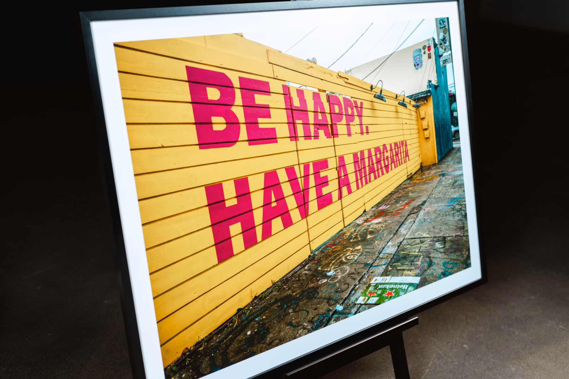 Foto mit der Aufschrift "Be Happy Have A Margherita"